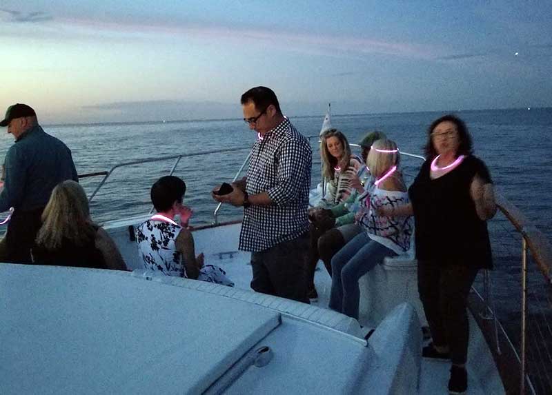 Calm and reflective sunset 60th Birthday Chicago Yacht Party cruise| Adelines Sea Moose